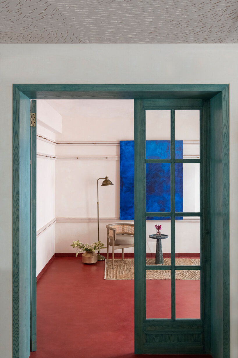 mediterranean hues flow into renovated artist studio space in india