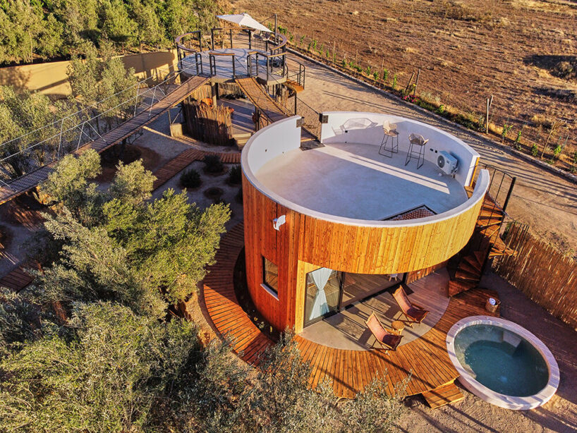 terraces and hanging bridges connect the zeuhary cabins in a mexican vineyard