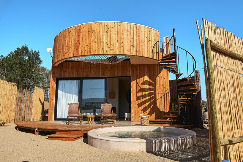 terraces and hanging bridges connect the zeuhary cabins in a mexican vineyard