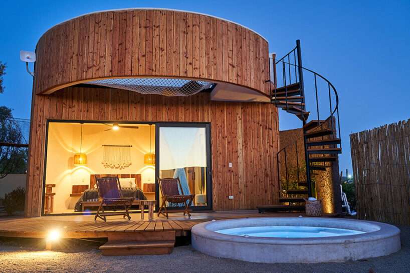 terraces and hanging bridges connect the zeuhary cabins in a mexican vineyard