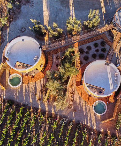 terraces and hanging bridges connect the zeuhary cabins in a mexican vineyard