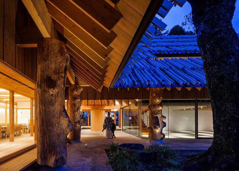 kengo kuma's timber louvers echo thatched roof of aoi aso shrine