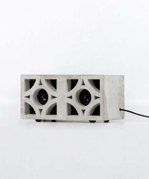 studio semblance fits a stereo inside of a concrete masonry block
