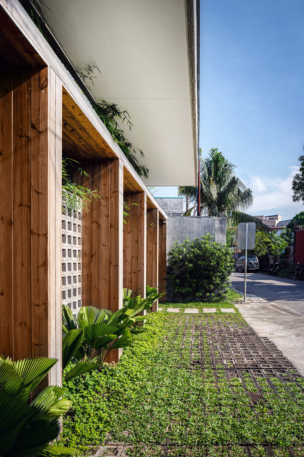 residence's concrete block screen welcomes sunlight in manila