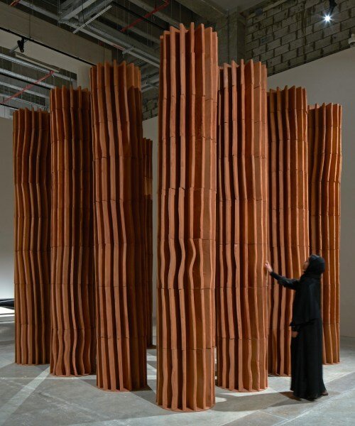 sahel alhiyari's fluted terracotta columns at design doha are an ode to classical antiquity