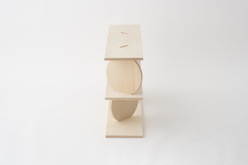 kengo kuma's modular wooden shelf with moving plates carries on 