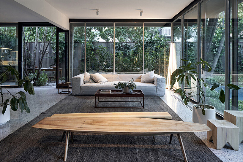 la base studio designs 'casa mendoza' as a glass box in a private garden
