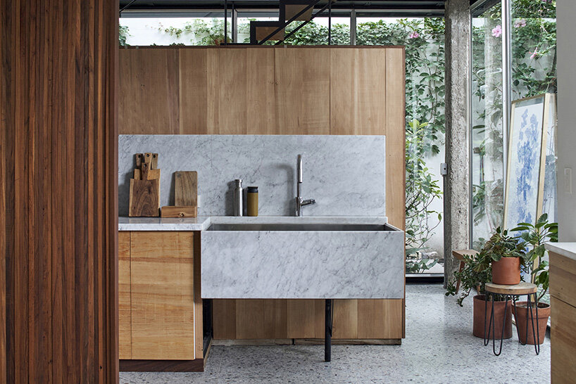 la base studio designs 'casa mendoza' as a glass box in a private garden