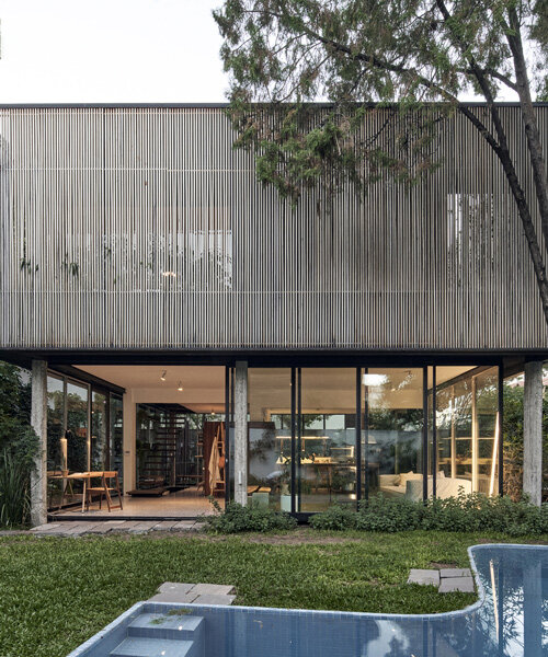 la base studio designs 'casa mendoza' as a glass box in a private garden