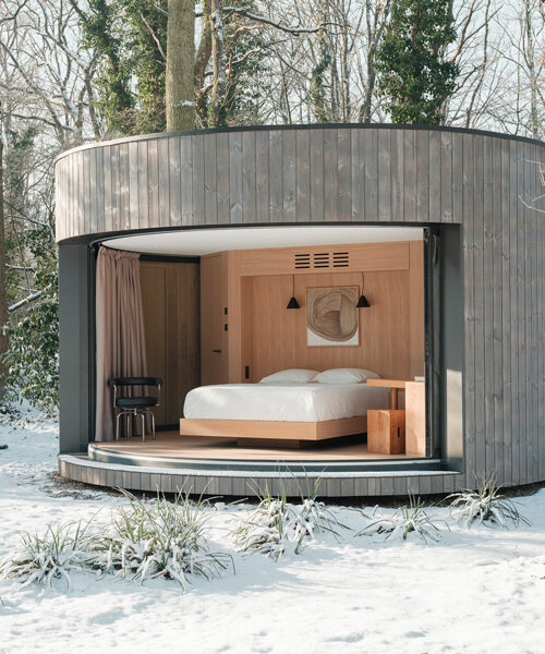 rounded wooden lumipod 5 and sauna interrelate with modernist villa besson in france