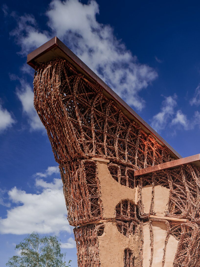 regrow willow poses hybrid earth construction system strengthened with digital fabrication