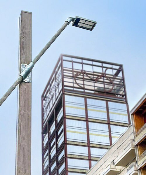 studio 5•5 repurposes scaffolding pipes and street lamps to illuminate paris olympic village