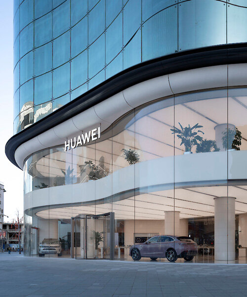 undulating glazed panels enfold superimpose's huawei flagship store in beijing
