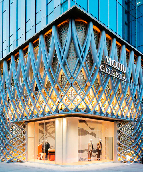 antistatics bents aluminum sheets into weaved facade for concept flagship store in beijing