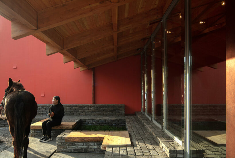 WAAAM museum's glazed yellow facade enlivens the beigou village in china