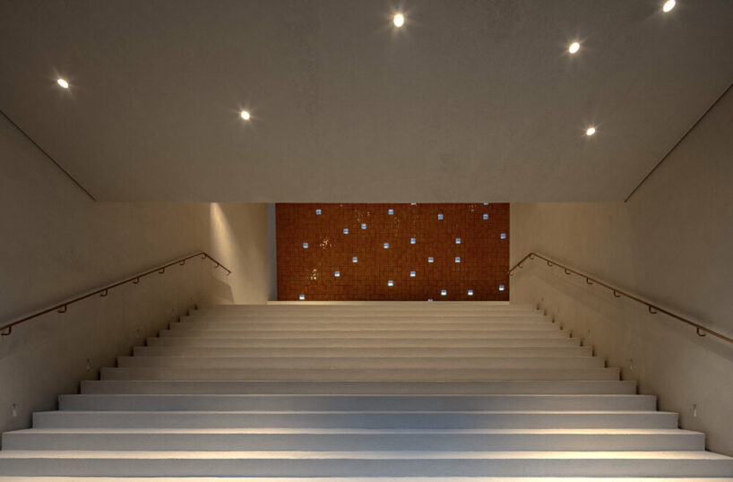 WAAAM museum's glazed yellow facade enlivens the beigou village in china