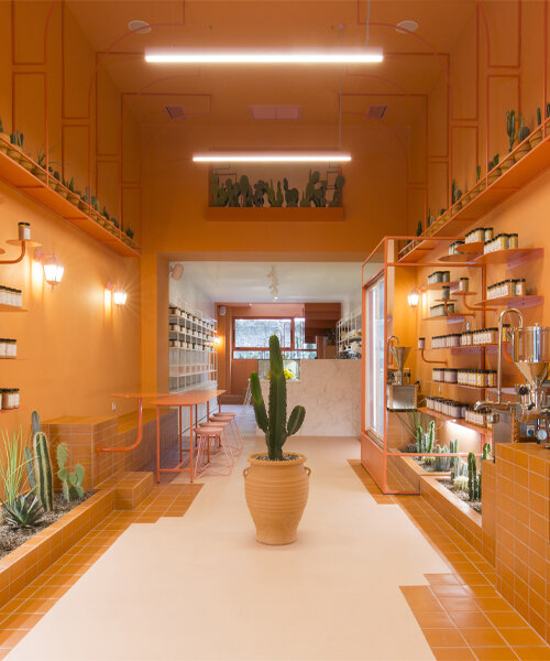 terracotta-orange hue engulfs studiomateriality's wild souls shop design in athens