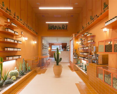 terracotta-orange hue engulfs studiomateriality's wild souls shop design in athens