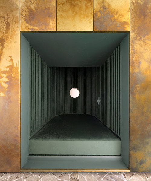 brass and green marble wrap AMAA's 'golden box' intervention in northern italian apartment