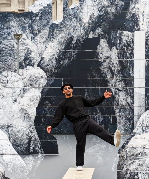 JR’s new monumental rock installation ‘la nascita’ emerges in front of milan central station