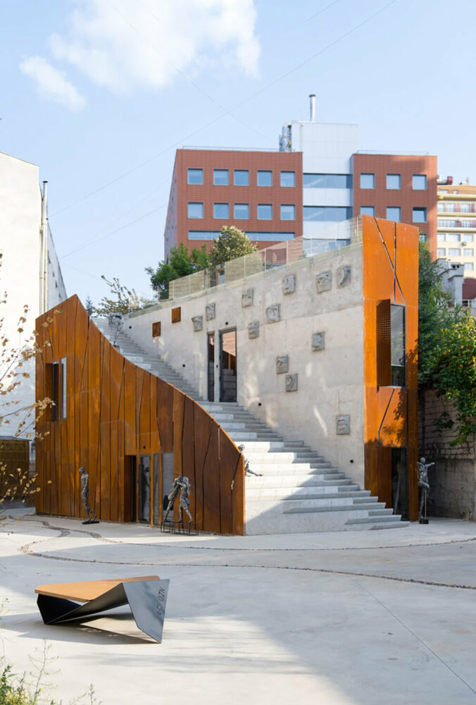 maxim calujac wraps concrete in corten steel for chisinau's ARTCOR