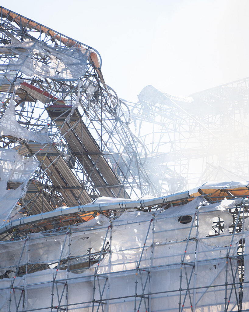 new photographs show historic bourse of copenhagen ravaged by fire