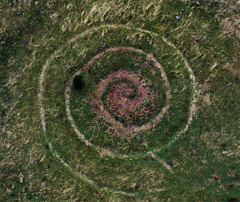 spiral land art by mathieu nouhen conjures mystical undertones in rural france