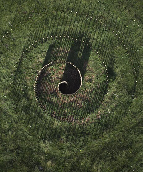 spiral land art by mathieu nouhen conjures mystical undertones in rural france
