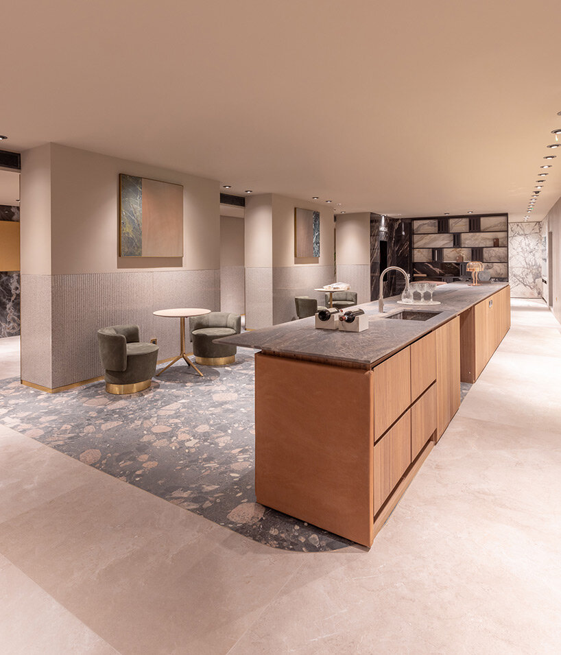 iris ceramica group builds path of fluid ceramic poetry leading visitors to new showroom