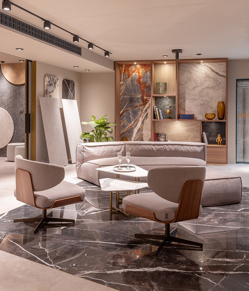 iris ceramica group builds path of fluid ceramic poetry leading visitors to new showroom