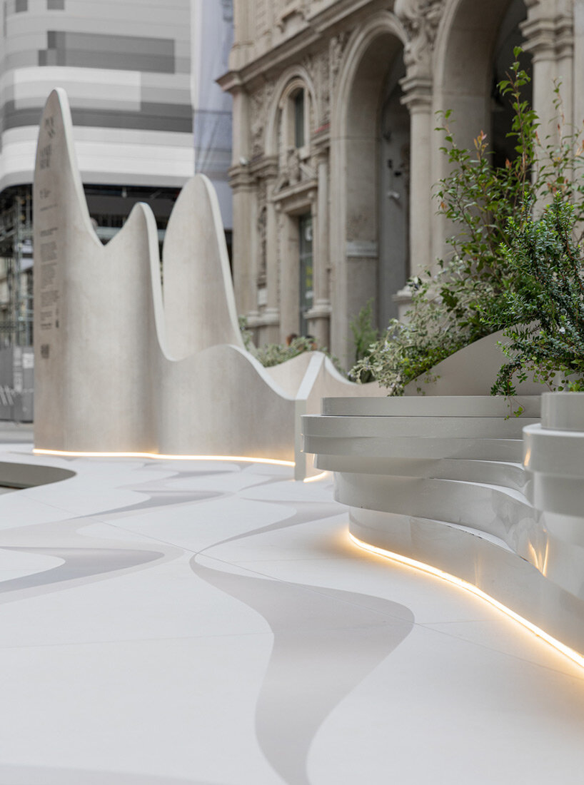 iris ceramica group builds path of fluid ceramic poetry leading visitors to new showroom