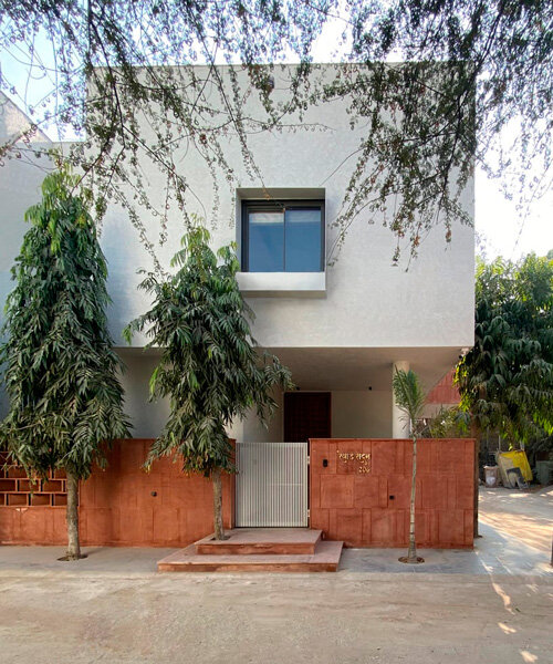 red sandstone jali lattice encloses jaipur house's facade by nuar studios