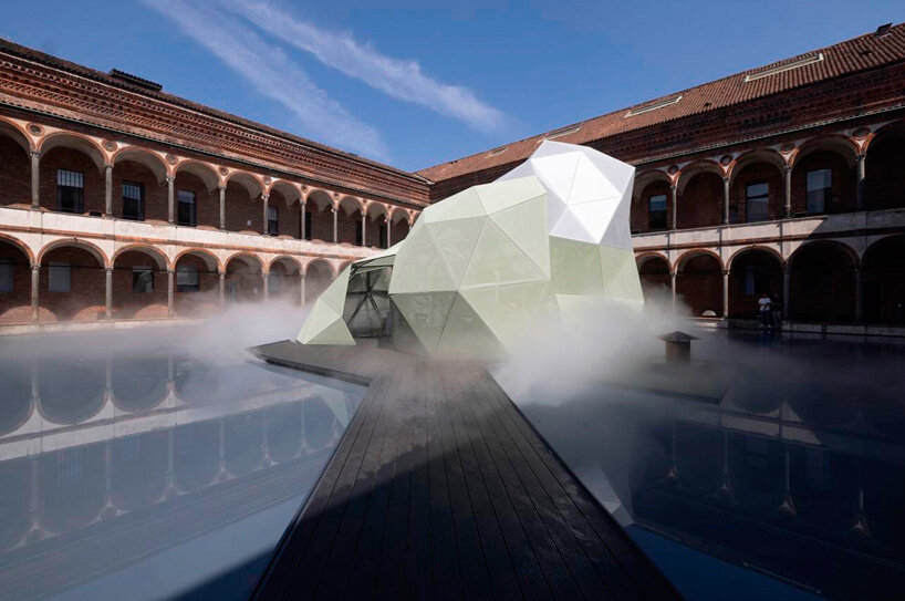 perforated metalized membrane coats MAD's amazing walk triangular installation in milan