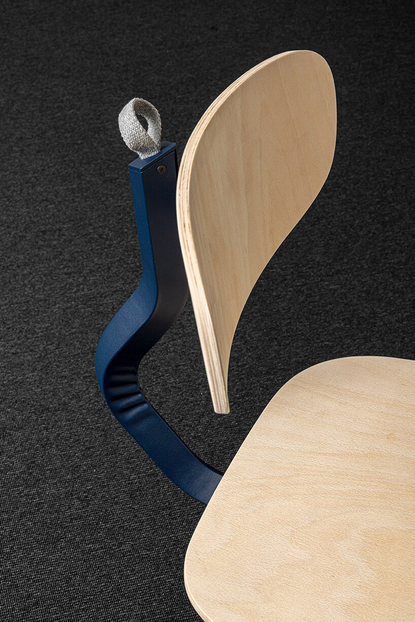 AMDL CIRCLE bends steel-back mara TYPO chair with robust yet soft creases