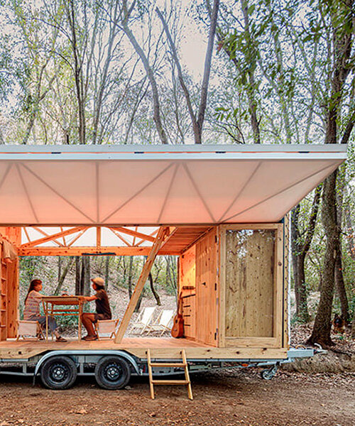 self-sufficient mobile home made of dowel-laminated timber rides on wheels