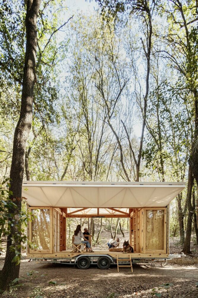 self-sufficient mobile home made of dowel-laminated timber rides on wheels