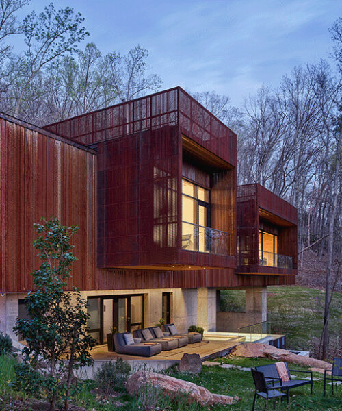 HEDS architects' wraps residence in the woods in corten steel corrugated to an owl's hoots