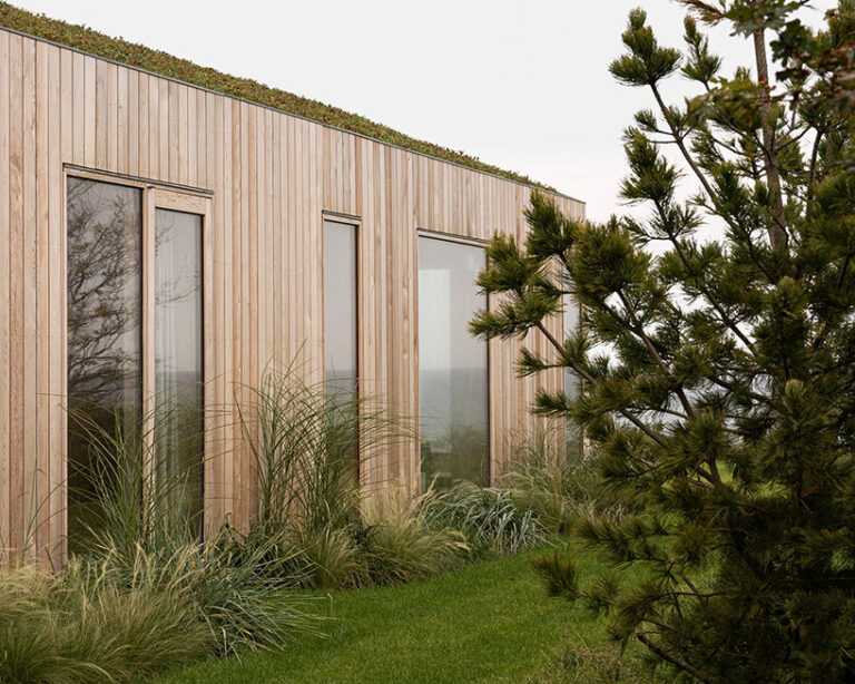 norm architects' heatherhill beach house reinvents danish summerhouses