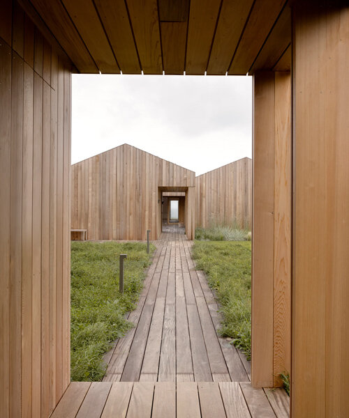 norm architects reinvents the danish summerhouse with its heatherhill beach house