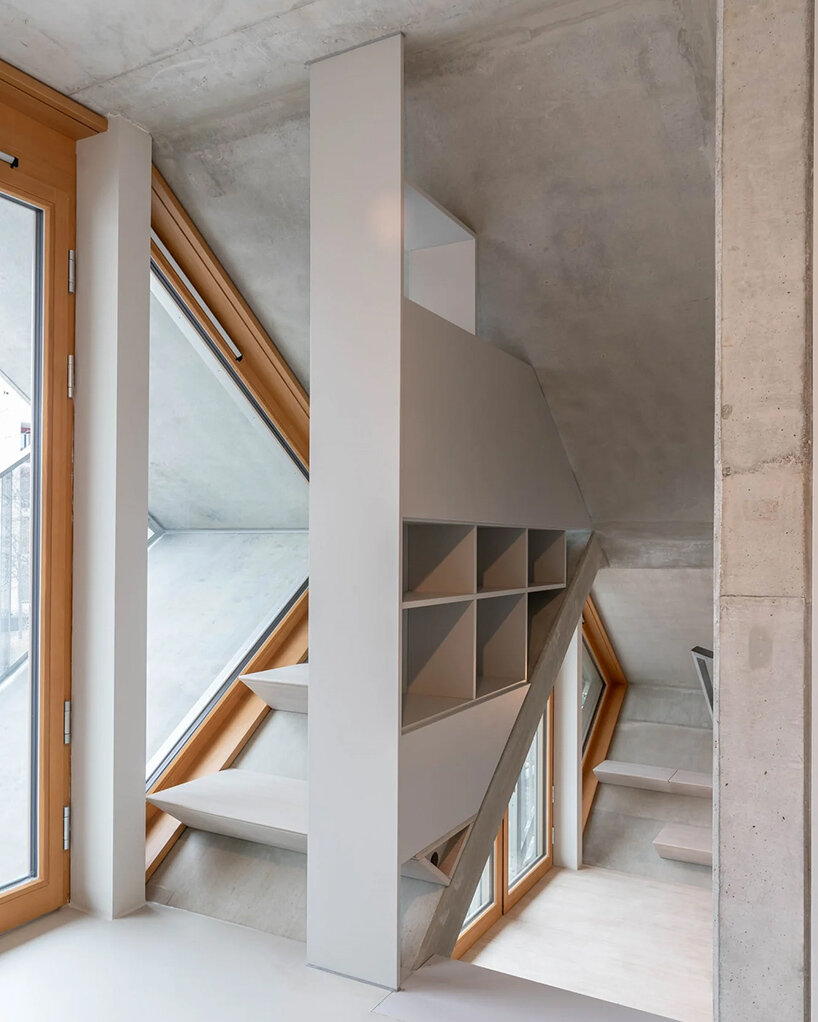 honeycomb apartments by peter haimerl bring sloping homes to munich