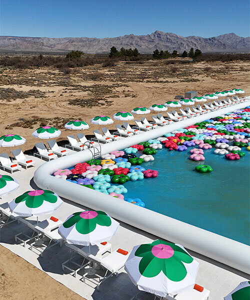 vibrant inflatable pool installation by Cj hendry pops up in the nevada desert