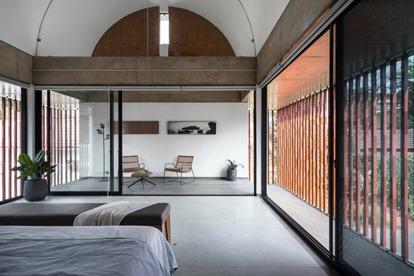 LIJO RENY fronts the stoic wall residence with fluted terracotta blocks in kerala