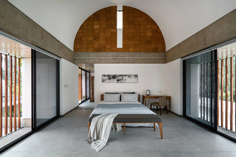 LIJO RENY fronts the stoic wall residence with fluted terracotta blocks in kerala