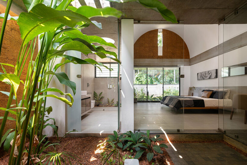 LIJO RENY fronts the stoic wall residence with fluted terracotta blocks in kerala