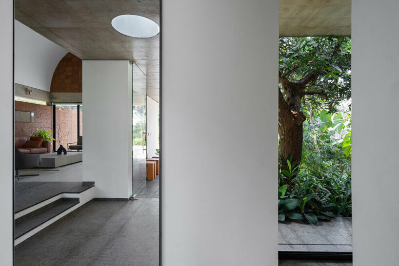 LIJO RENY fronts the stoic wall residence with fluted terracotta blocks in kerala