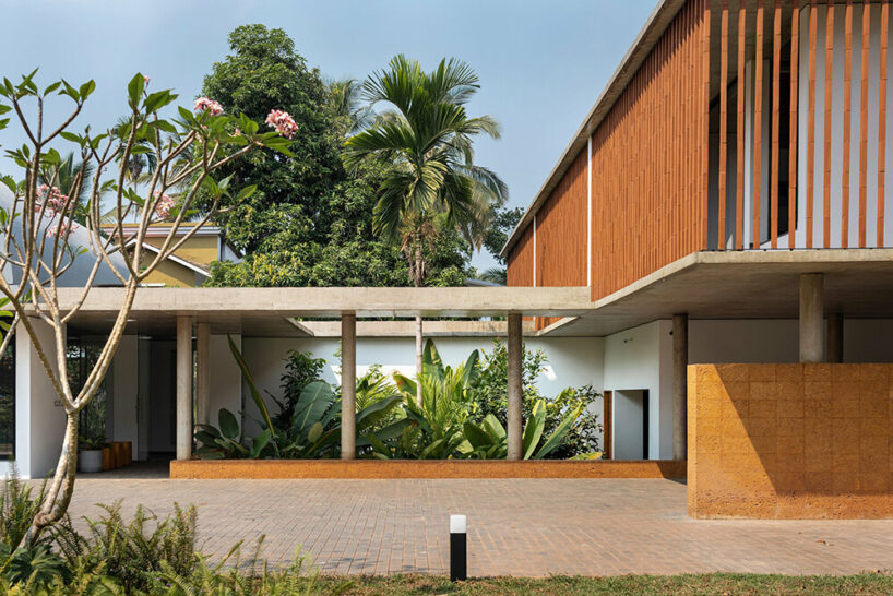 LIJO RENY fronts the stoic wall residence with fluted terracotta blocks in kerala