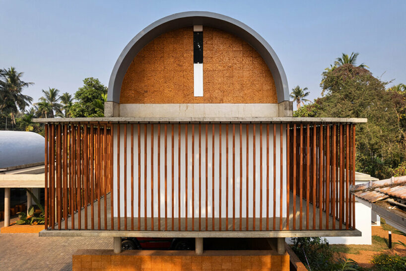 LIJO RENY fronts the stoic wall residence with fluted terracotta blocks in kerala