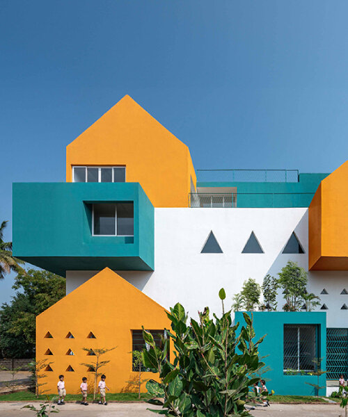 projected cantilevers and recessed windows in vibrant hues shape school in india