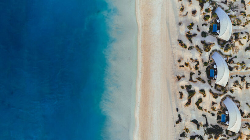 kengo kuma turns wood and clay into offshore red sea villas in saudi arabia