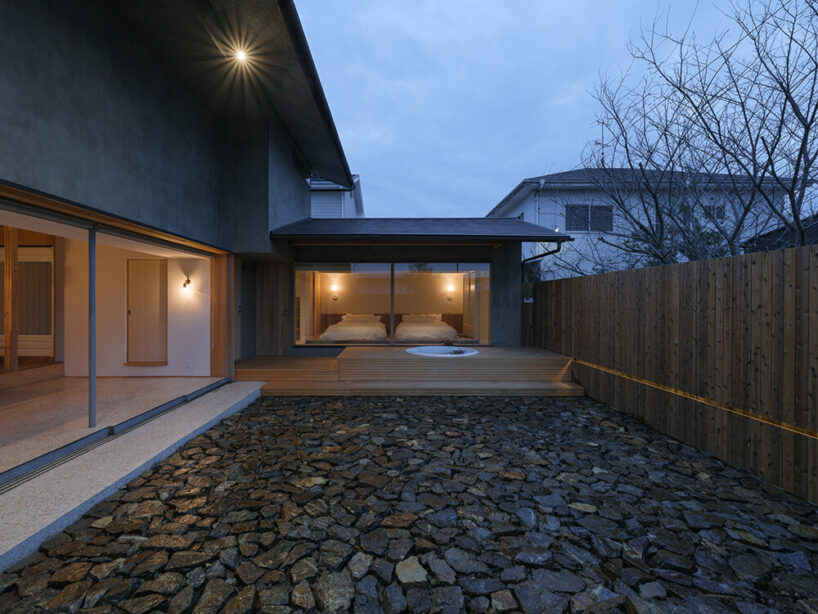 a viewing room playfully protrudes from tetra works' rental villa in hiroshima